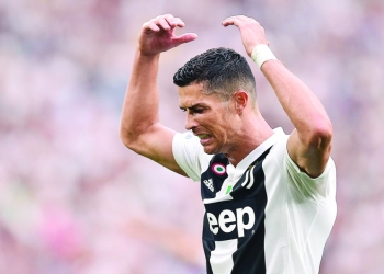 Juventus' Cristiano Ronaldo reacts during the Serie A soccer match between Juventus and Lazio at the Allianz Stadium in Turin, Italy, Saturday, Aug. 25, 2018. (Alessandro Di Marco/ANSA via AP)