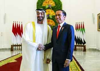 JAKARTA, INDONESIA - July 24, 2019 HH Sheikh Mohamed bin Zayed Al Nahyan, Crown Prince of Abu Dhabi and Deputy Supreme Commander of the UAE Armed Forces (L), and HE Joko Widodo, President of Indonesia (R), stand for a photograph during a reception at the Bogor Presidential Palace.  ( Mohamed Al Hammadi / Ministry of Presidential Affairs ) ---