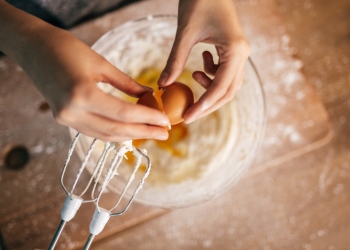 Woman making cupcakes