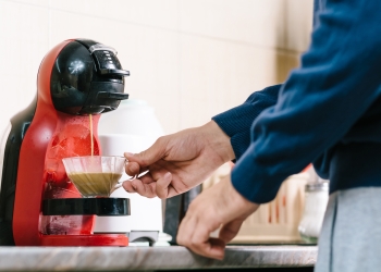 Man making coffee with coffee maker