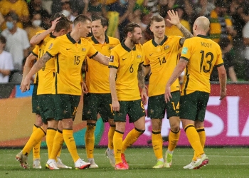 Australia's players celebrate a goal during the FIFA World Cup Qatar 2022 football qualification match between Australia and Vietnam in Melbourne on January 27, 2022. (Photo by Con CHRONIS / AFP) / -- IMAGE RESTRICTED TO EDITORIAL USE - STRICTLY NO COMMERCIAL USE --