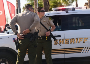 Armed officers from the Sheriff's department on patrol near the scene of the crime in San Bernardino, California on December 2, 2015.   A man and a woman suspected of carrying out a deadly shooting at a center for the disabled in California were killed in a shootout with police, while a third person was detained, police said. AFP PHOTO / FREDERIC J. BROWN / AFP / FREDERIC J. BROWN