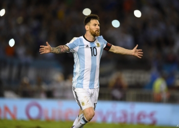 Argentina's Lionel Messi celebrates after scoring against Chile during their 2018 FIFA World Cup qualifier football match at the Monumental stadium in Buenos Aires, Argentina, on March 23, 2017. / AFP PHOTO / EITAN ABRAMOVICH